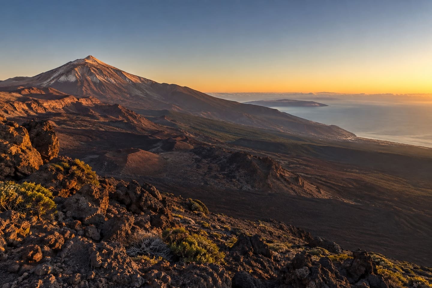 Mount Teide and Tenerife's volcanic landscape above the Atlantic at sunrise